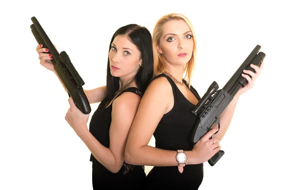 Two beautiful women with guns — Stock Photo, Image