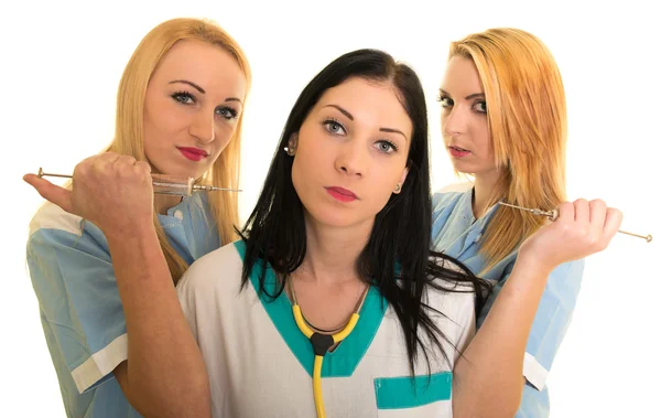 Doctor with two nurses — Stock Photo, Image