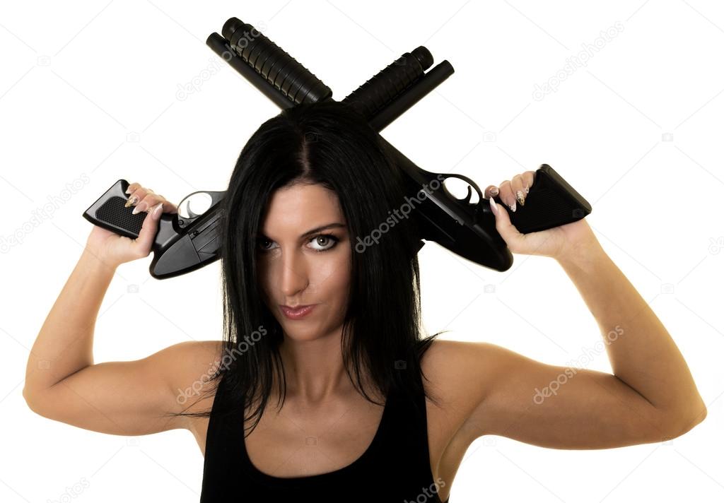 Beautiful woman with two guns