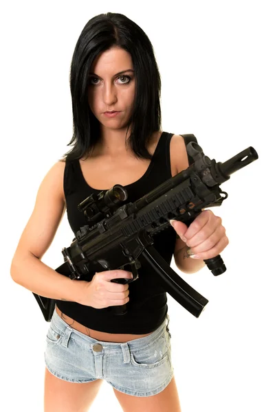 Vacker kvinna med pistol — Stockfoto