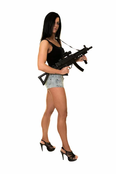 Beautiful woman with gun — Stok fotoğraf