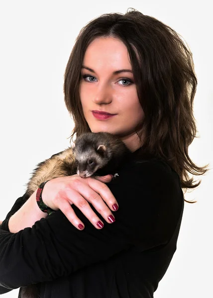 Beautiful girl holding a ferret — Stock Photo, Image