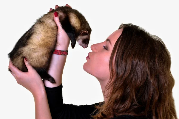 Beautiful girl holding a ferret — Stock Photo, Image