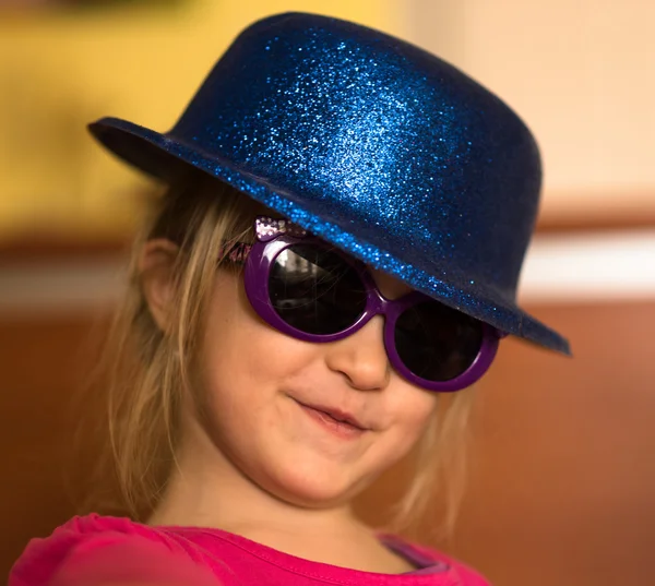 Little girl in hat and glasses — Stock Photo, Image