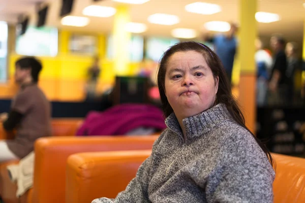 Woman with down syndrome at bowling — Stock Photo, Image