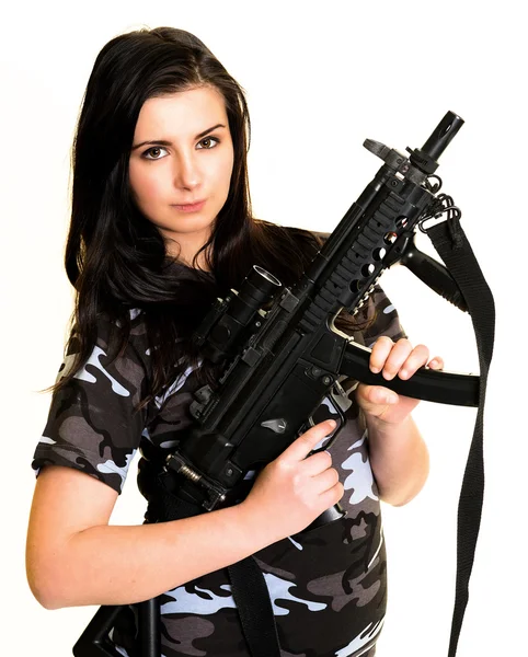 Beautiful woman with gun — Stockfoto