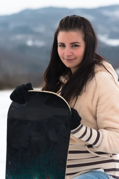 Mujer snowboarder al aire libre —  Fotos de Stock