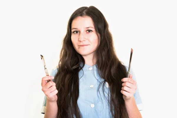 Jeune femme avec des outils médicaux — Photo