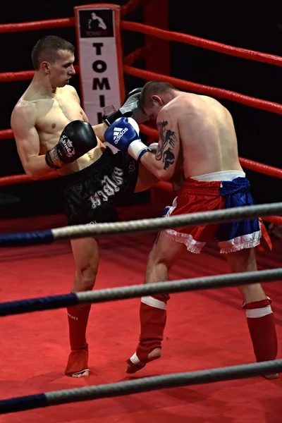 Strong fighter and his opponent during a fight in a ring Combat Fight Night — Stock Photo, Image