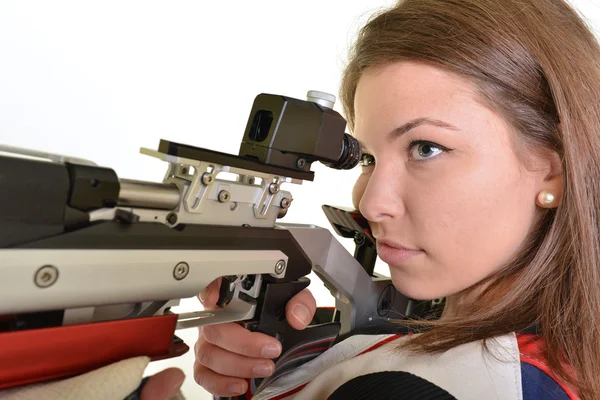 Mujer entrenamiento deporte tiro con pistola de aire comprimido — Foto de Stock