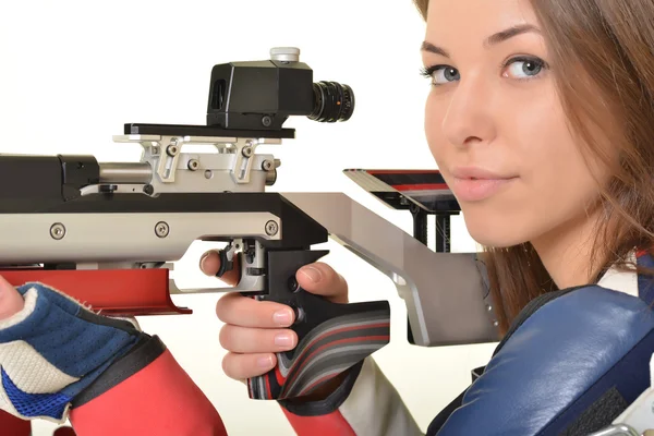 Mujer entrenamiento deporte tiro con pistola de aire comprimido — Foto de Stock