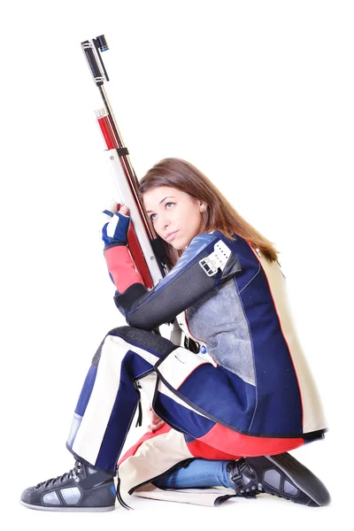 Žena školení sportovní střelbě vzduchovku zbraní — Stock fotografie