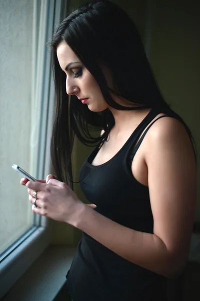 Beautiful woman with cell phone — Stock Photo, Image