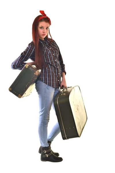 Jonge vrouw met valises — Stockfoto