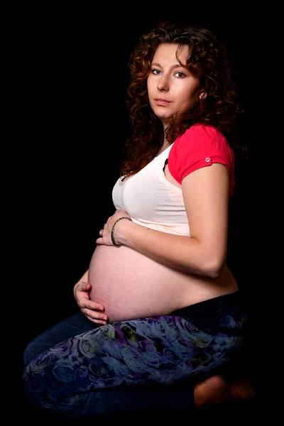 Schöne schwangere Frau — Stockfoto