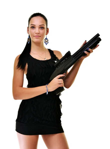 Красивая девушка с оружием — стоковое фото