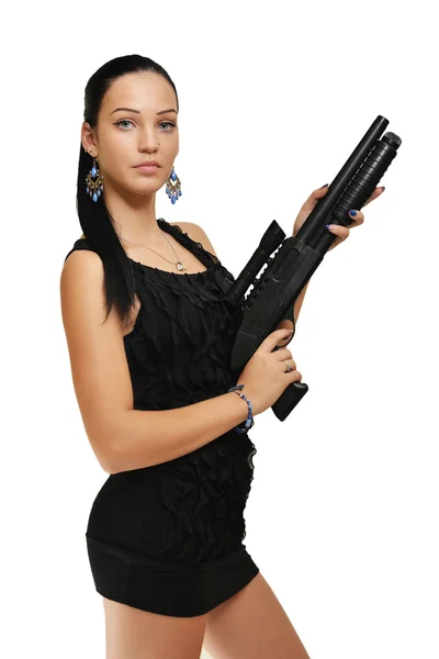 Красивая девушка с оружием — стоковое фото
