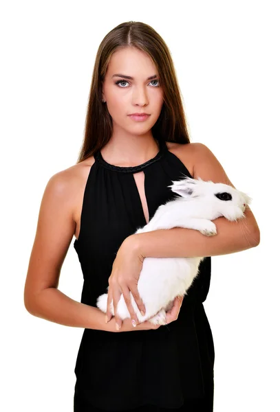 Женщина с белым кроликом — стоковое фото