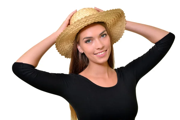 Молода жінка в солом'яній шапці — стокове фото