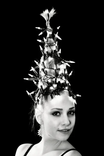 Mujer con luces de árbol de Navidad —  Fotos de Stock