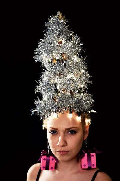 Mujer con luces de árbol de Navidad —  Fotos de Stock