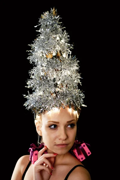 Vrouw met kerstboom lichten — Stockfoto