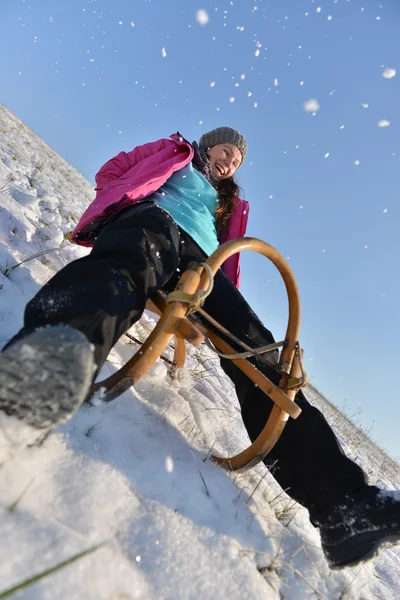 Happy woman on sleigh — Stock Photo, Image