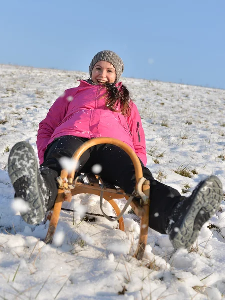 Happy woman on sleigh — Stock Photo, Image