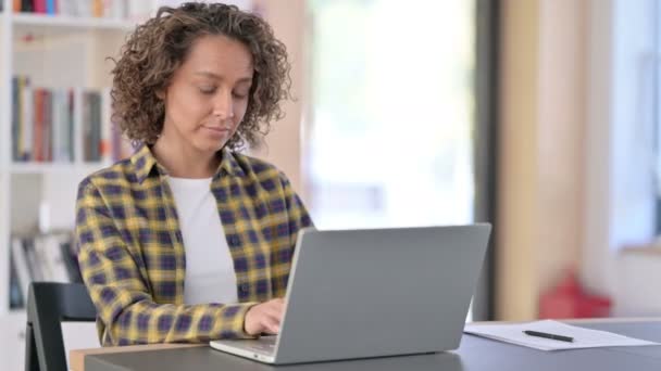 Young Mixed Race Woman at Work using Laptop — Stock Video