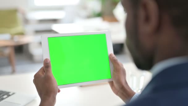 Businessman Watching Tablet with Green Chroma Key Screen — Stock Video