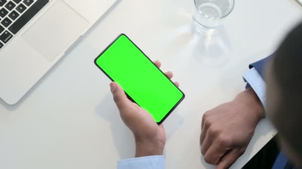 Businessman using Smartphone with Green Chroma Key Screen — Stock Video