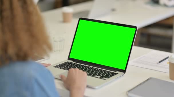 African Woman Using Laptop with Green Chroma Key Screen — Stock Video