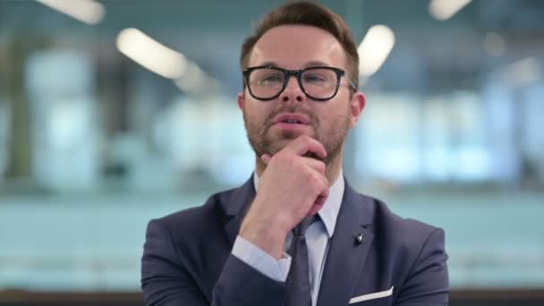 Portrait of Pensive Middle Aged Businessman Thinking — Stock Video