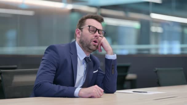 Middle Aged Businessman Taking Nap at Work — Stock Video