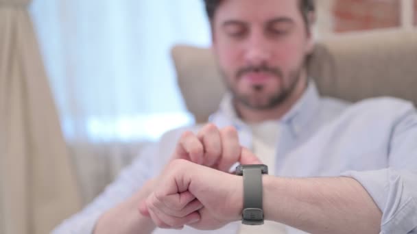 Portrait of Young Man using Smart Watch — Stock Video