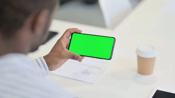 African Man doing Video Call on Smartphone with Chroma Screen — Stock Photo, Image