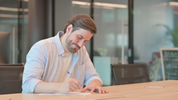 Pensive Mature Adult Man Writing on Paper, Thinking — Stock Video