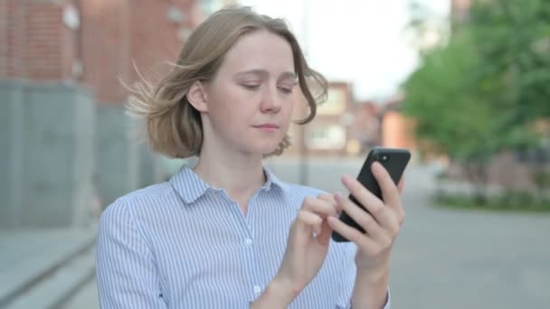 Portrait of Woman using Smartphone, Outdoor — Stock Video