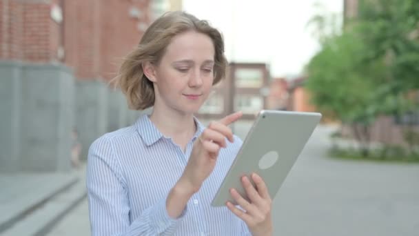 Portrait of Attractive Woman using Tablet while Walking in Street — Stock Video