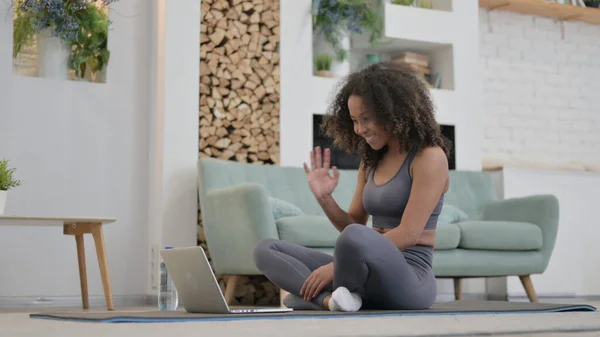 African Woman Talking on Video Call on Laptop on Yoga Mat — Φωτογραφία Αρχείου