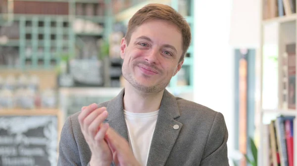 Portrait of Young Man Clapping, Applauding