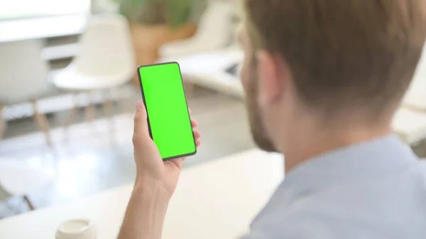 Young Man using Smartphone with Chroma Screen — Stock Photo, Image