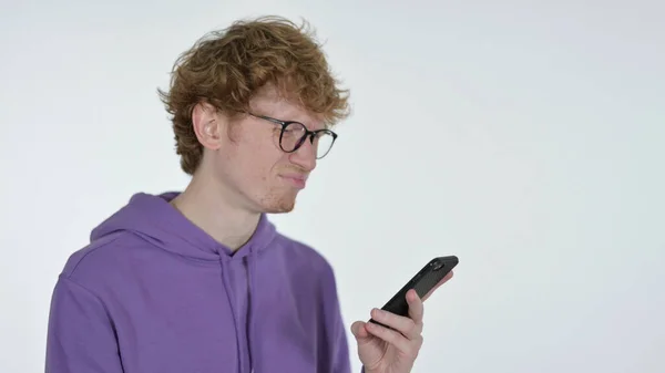 Failure on Smartphone by Redhead Young Man on White Background — Stock Photo, Image