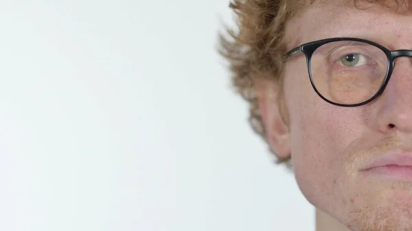 Gros plan de Half Face of Serious Redhead Young Man — Photo