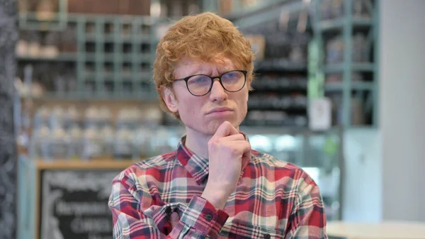 Portrait of Curious Young Redhead Young Man Thinking About Something — Stock Photo, Image