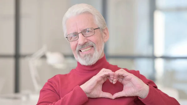 Portrait of Old Man showing Heart Sign by Hand — Stock Photo, Image