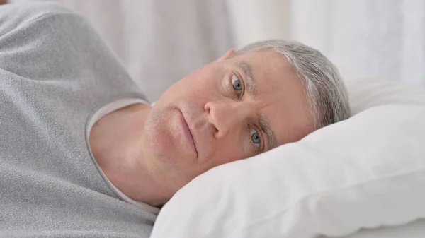 Close up of Old Man Awake in Bed Thinking — Stock Photo, Image