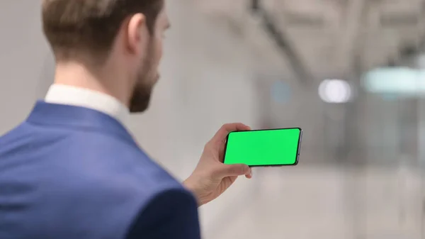 Businessman Watching Smartphone with Green Screen — Stock Photo, Image