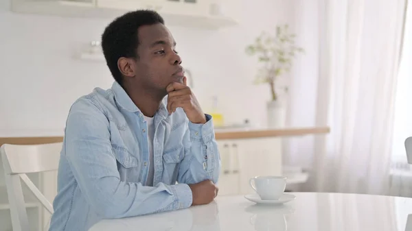 Pensive African Man Thinking at Home — Stock Photo, Image