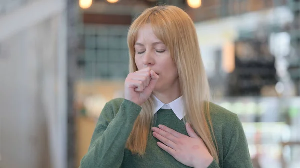 Portrait of Sick Woman Coughing